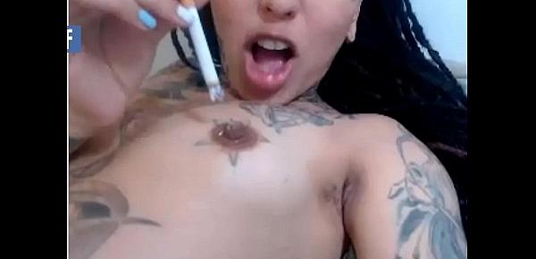  Tatted camgirl burns self with cigarette